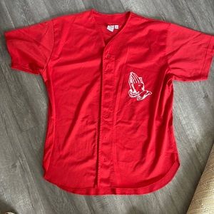 Folded hands baseball tee.